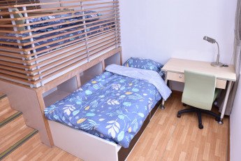 Room with three beds